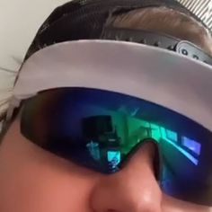 a close up of a person wearing ski goggles