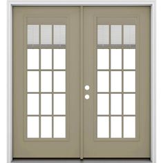 a double door with two sidelights and blinds on the top half, in front of a