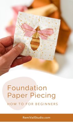 someone holding up a piece of paper with the words foundation paper piecing how to for beginners