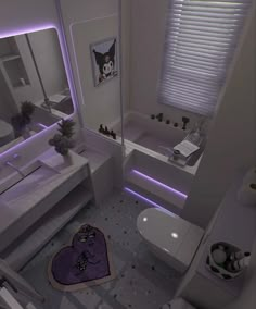 the bathroom is decorated in white and purple