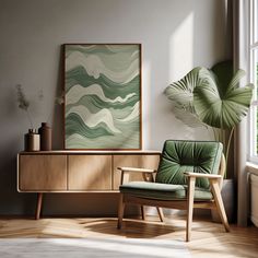 a green chair sitting in front of a window next to a painting on the wall