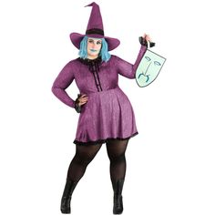 a woman in a purple dress and hat holding a green mask on her left hand