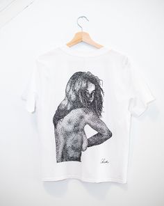 This is my original artwork design! It uses the stippling technique of placing thousands of individual dots on the paper. The artwork was then scanned and screen printed by hand onto the t-shirts. The t-shirts are high quality and were sourced from AS colour. They are light weight (150 gsm) with a very cool, smooth texture. The Women's tee is a cube shape offering a slightly shorter body length, and "boxy" fit for those who like a casual look without being oversized. The Men's tee is a standard Hand Printed Graphic Tee With Short Sleeves, Stippling Technique, Cube Shape, Design Tshirt, Tee Shirt Homme, Smooth Texture, Artwork Design, Mens Tees, Original Design