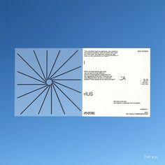 a white paper with black lines on it and a blue sky in the back ground