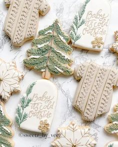 decorated christmas cookies on a marble table