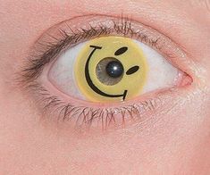 an eye with a smiley face painted on it