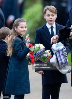 the duke and princess of cambridge are greeted by children at an official ceremony in london