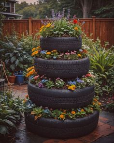 Creative Gardening | Thought I should share this unique idea for a standing garden using old car tires of different sizes | Facebook Old Tire Garden Ideas, Old Truck Garden Ideas, Old Tire Ideas, Recycled Tires Ideas, Tire Planters Ideas, Garden Ideas Using Old Tires, Tire Ideas, Tire Projects, Standing Garden