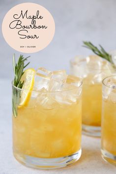 three glasses filled with lemonade and rosemary garnish