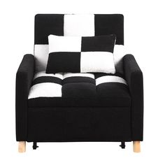 a black and white checkered chair with two pillows on the armrests is shown