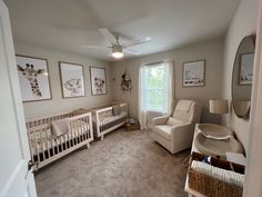 a baby's room with two cribs and a rocking chair in the corner