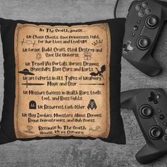 a pillow with an old fashioned poem on it and two video game controllers next to it