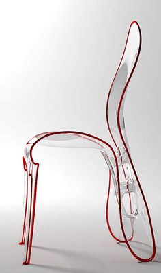 a clear chair with red lines on it