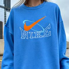 Nike Retro Swoosh Embroidered Sweatshirt - TM Nike Retro Swoosh Embroidered Sweatshirt - TM Sweatshirts are adult unisex with a sizing chart provided for reference. Fe... Nike Retro, Nike Crewneck, 90s Sweatshirt, Trendy Summer Outfits, Sweatshirt Outfit, Nike Sweatshirts