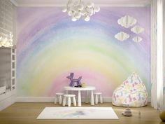 a child's room decorated in pastel colors with clouds painted on the wall