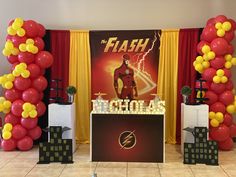 the flash birthday party is set up with balloons