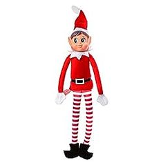 the elf is standing with his hands in his pockets