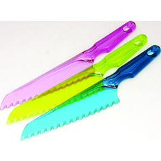 three colorful plastic combs sitting next to each other on top of a white table