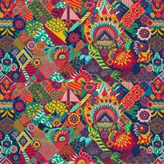 a colorful pattern with many different colors and shapes on it, including an ornate design