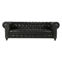 a black leather couch with buttons on the back and arms, in front of a white background