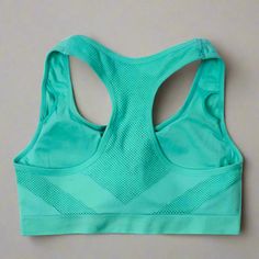 Stay supported and comfortable with our FlexSupport Sports Bra. Designed for high-impact activities, this breathable, sweat-wicking bra offers padded support and shockproof protection. Ideal for the gym, running, or yoga, it ensures you stay dry, comfortable, and confident during every workout. Stretch Sports Bra With Built-in Padding For Light Sports, High Stretch Sports Bra With Built-in Padding For Training, Supportive Racerback Sports Bra With Built-in Padding, Racerback Activewear With Built-in Padding For Light Sports, High Stretch Light Support Activewear For Sports Events, Supportive Activewear With Built-in Padding For Light Sports, Breathable Functional Activewear For Light Sports, Functional Breathable Activewear For Light Sports, Supportive Nylon Activewear For Light Sports