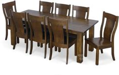 a wooden dining table with six chairs around it