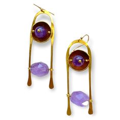 Handcrafted in brass in a simple inverted "U" shape with gemstones suspended between each side. The gemstone closest to the ear is a polished round sphere framed in a brass cup Colorful Gemstones, Red Quartz, A Ladder, Handmade Brass, Brass Frame, Brass Earrings, Purple Amethyst, Handmade Earrings, Lapis Lazuli