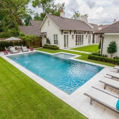 a large pool in the middle of a yard