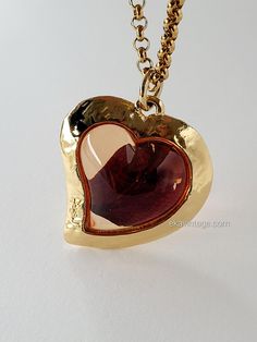 Authentic vintage Yves Saint Laurent Heart pendant with a rose petal inside. The chain provided with the pendant is not original. Created in the 1980s. Very good general condition. Signed "YSL". Dimensions: H - 5.0 cm, L - 4.0 cm. Free worldwide shipping with tracked parcel. Comes in a fabric pouch. Do not hesitate to contact me for any additional information (delivery method, request for additional photos, etc.). Saint Laurent Vintage, Vintage Yves Saint Laurent, Fabric Pouch, Vintage Ysl, Vintage Heart, Mode Vintage, Heart Pendant, Halloween Shopping, Yves Saint Laurent