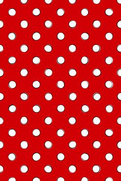 a red background with white polka dots