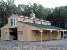 an image of a horse barn with two stalls