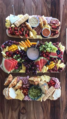 two platters filled with different types of food