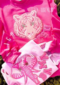 This listing is for the LETTERING option of our Preppy Pink Mascots™. You MUST enter your choice of MASCOT and the LETTERING you wish in the comment portion. Please select your size and color option. Preppy team sweatshirt, pink mascot patch sweatshirt, preppy game day mascot star sweatshirt, game day sweatshirt, chenille patch, cheerleading team gifts Hot Pink and Light Pink sweatshirts really make these Pink Preppy Mascots POP! - indicate EXACTLY what wording you would like in the comments. If Pink Pre-shrunk Long Sleeve T-shirt, Pink Long Sleeve Pre-shrunk T-shirt, Customizable Pink Tops For Game Day, Pink Crew Neck Top For Fans, Pink Letter Print Tops For College, Pink Long Sleeve Tops For Game Day, Customizable Sporty Pink Tops, Pink Cotton Fan Apparel Tops, Pink Pre-shrunk Cotton Sweatshirt