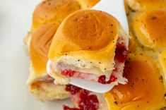 These Cranberry Turkey Sliders channel all of the fall vibes with warm bread, melty cheese, and bright cranberry sauce!