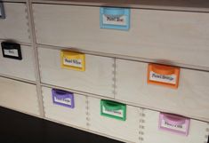 file cabinets with labels on each drawer