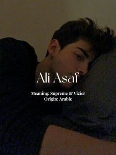 a man laying on top of a bed under a blanket with the words ali asaf