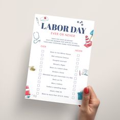 a person holding up a labor day checklist