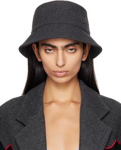 Wool-blend felt bucket hat in gray. · Logo embroidered at face · Quilted brim · Full twill lining Supplier color: Grey Fringed Belt, Lipstick Bag, Floral Shoes, Fringe Skirt, Poncho Cape, Mens Scarves, Scarf Men, Suit Accessories, Logo Embroidered