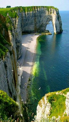 an aerial view of the beach and cliffs