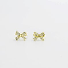 Gold plated bow stud earrings with crystals. Earrings With Crystals, Rhinestone Bow, Small Bows, Clear Coat, Bag Straps, Earring Necklace, Gemstone Necklace, Sales Gifts, Gift Necklace