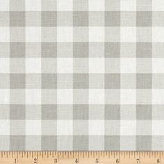 a gray and white checkered fabric with a ruler