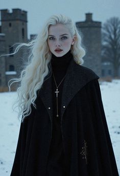 a woman with long blonde hair wearing a black coat and cross necklace standing in the snow