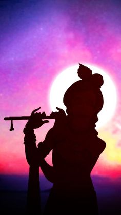 the silhouette of a person holding a trumpet in front of a sunset