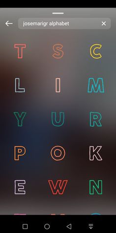 an iphone screen with different colored letters on it