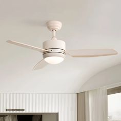 a white ceiling fan in a room