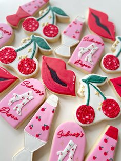 decorated cookies are arranged on a table