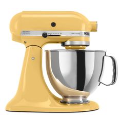 a yellow kitchen mixer on a white background