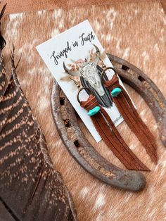 Our best selling Darby tassels now come in mini size! Perfect for those who like smaller earrings. They go great with any occasion; date night, summer concert or rodeo! **Earrings may vary slightly from the photo** Materials: Genuine Leather Faux turquoise bead Lightweight Earrings hang from lead and nickel free, silver hoops Size: 4” L Tassel Earrings Diy, Rodeo Earrings, Date Night Summer, Leather Tassel Earrings, Diy Tassel Earrings, Night Summer, Summer Concert, Lightweight Earrings, Small Earrings