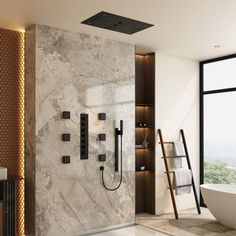 a modern bathroom with marble walls and floor, along with a freestanding shower head