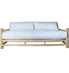 a white couch sitting on top of a wooden frame